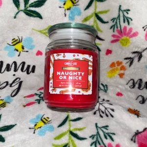 I am selling a LIMITED EDITION cinnamon candle labeled as (Naughty or nice)
